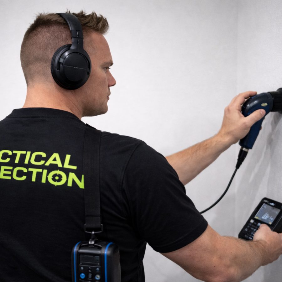 Christian using acoustic leak detection equipment