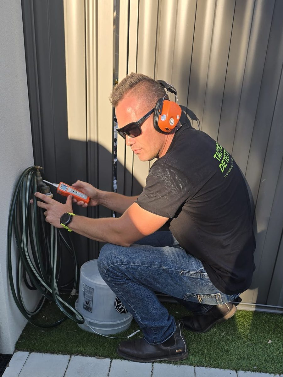 Outdoor leak testing near paving